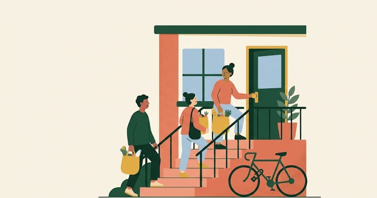 Two roommates carrying groceries up the steps of a shared apartment